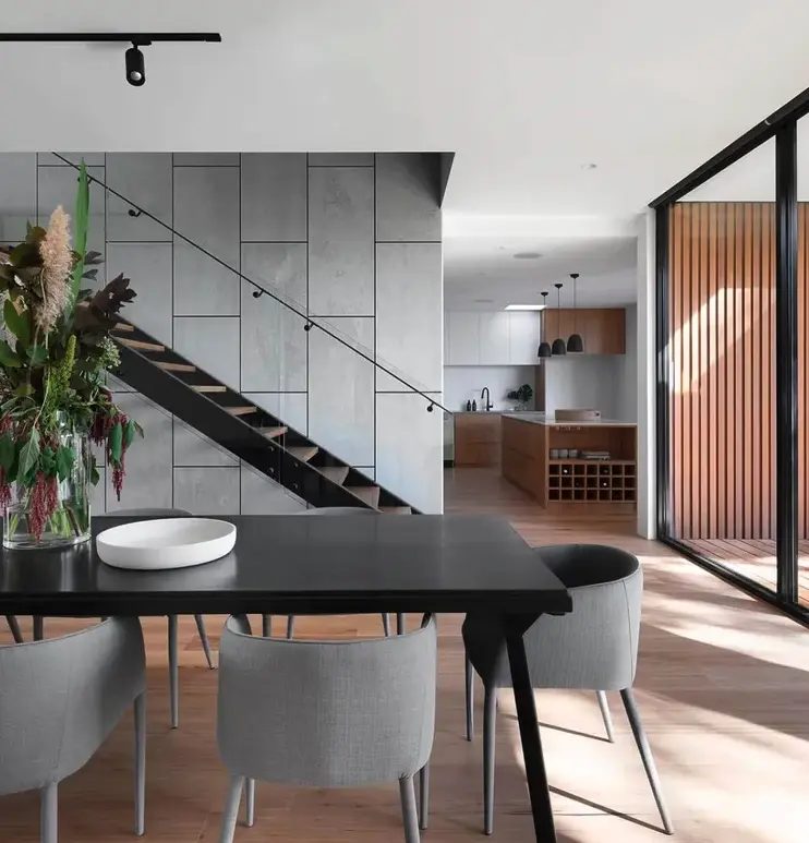Modern home interior with dining area and staircase
